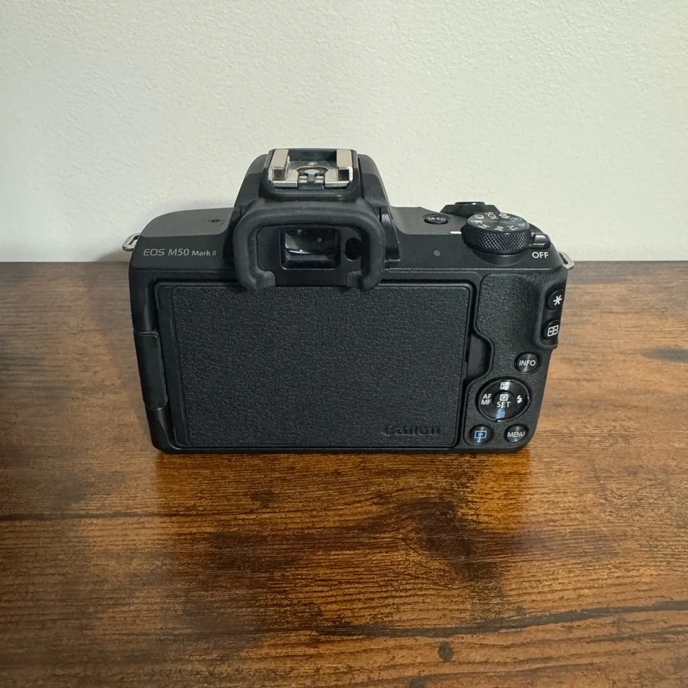 Canon EOS Black Camera with Dual Lenses